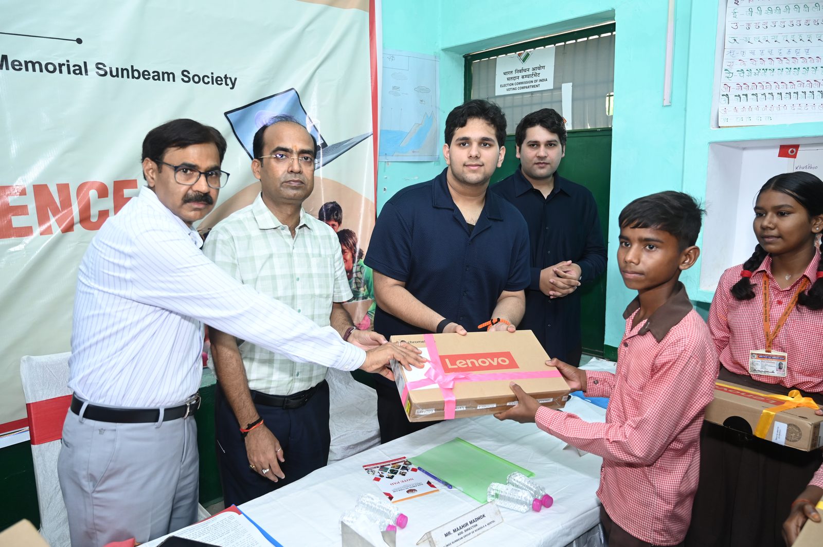 Children at Prathmik Vidyalay, Narur receiving digital learning kits
